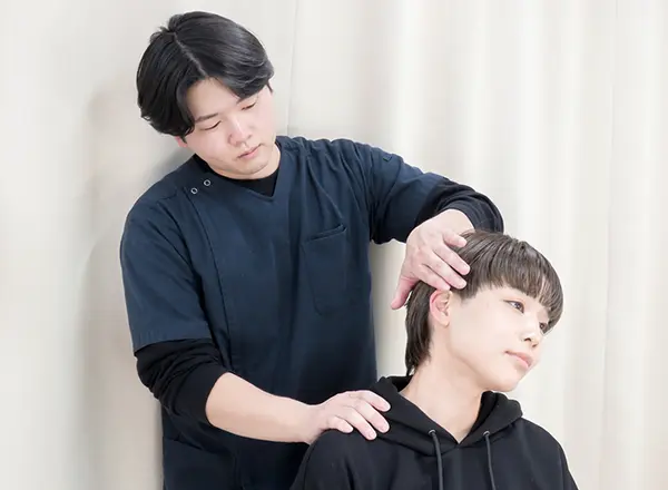 首の検査